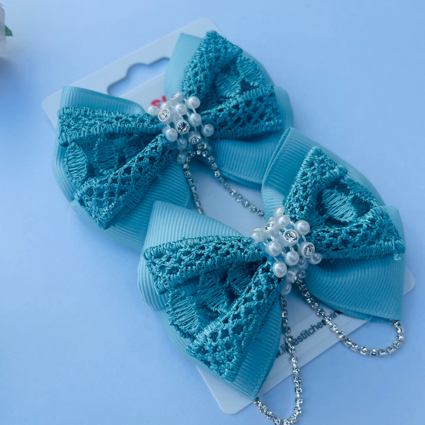 Handmade pastel blue grosgrain ribbon hair clip for kids with snap closure